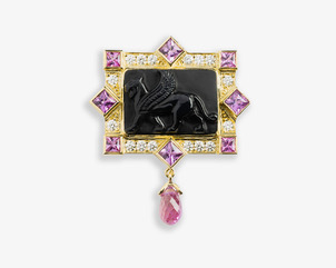 #2293 One 18kt yellow gold brooch, carved black onyx griffin, diamonds, pink sapphire