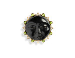 One 14kt gold brooch, carved jet face, green tourmaline, diamonds